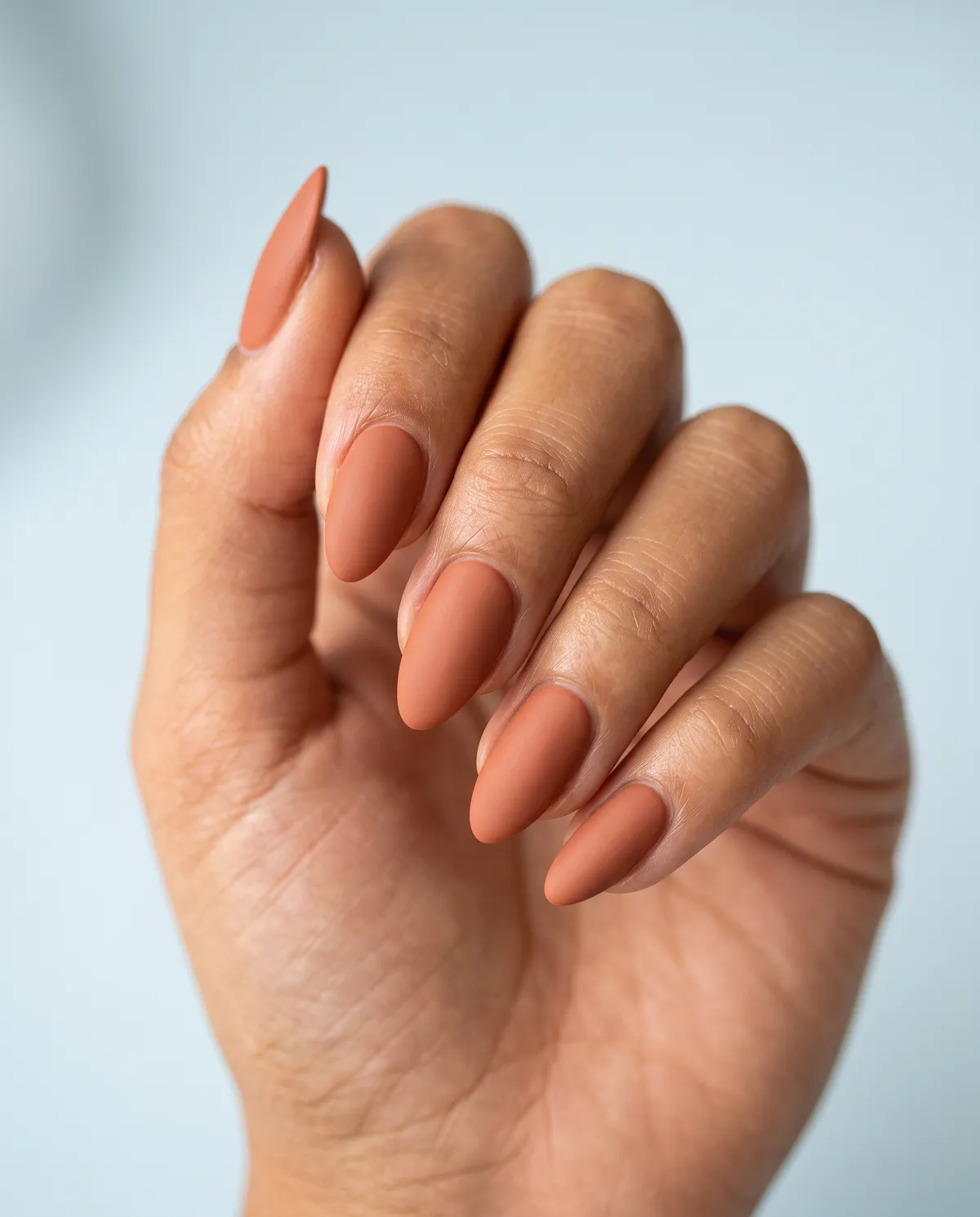 Matte Terracotta Almond — almond fall nails with terracotta crème with a matte top coat, medium almond, no art